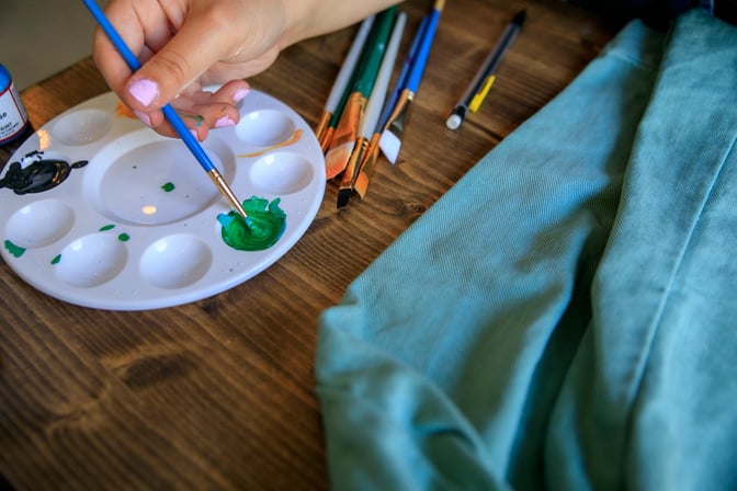 Woman Taking Green Paint from the Painting Palette